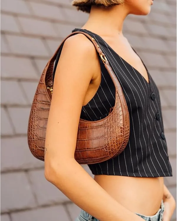 JW PEI Women's Harlee Shoulder Bag in Brown Croc, side view worn